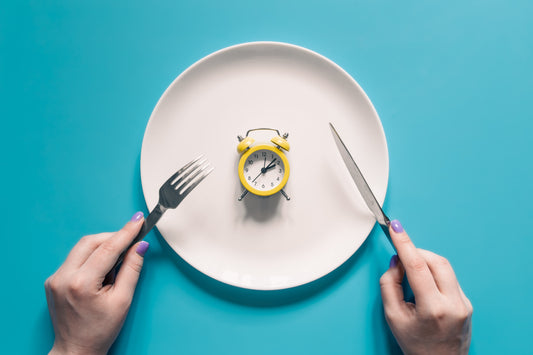 Plate with Alarm Clock, Fork, and Knife